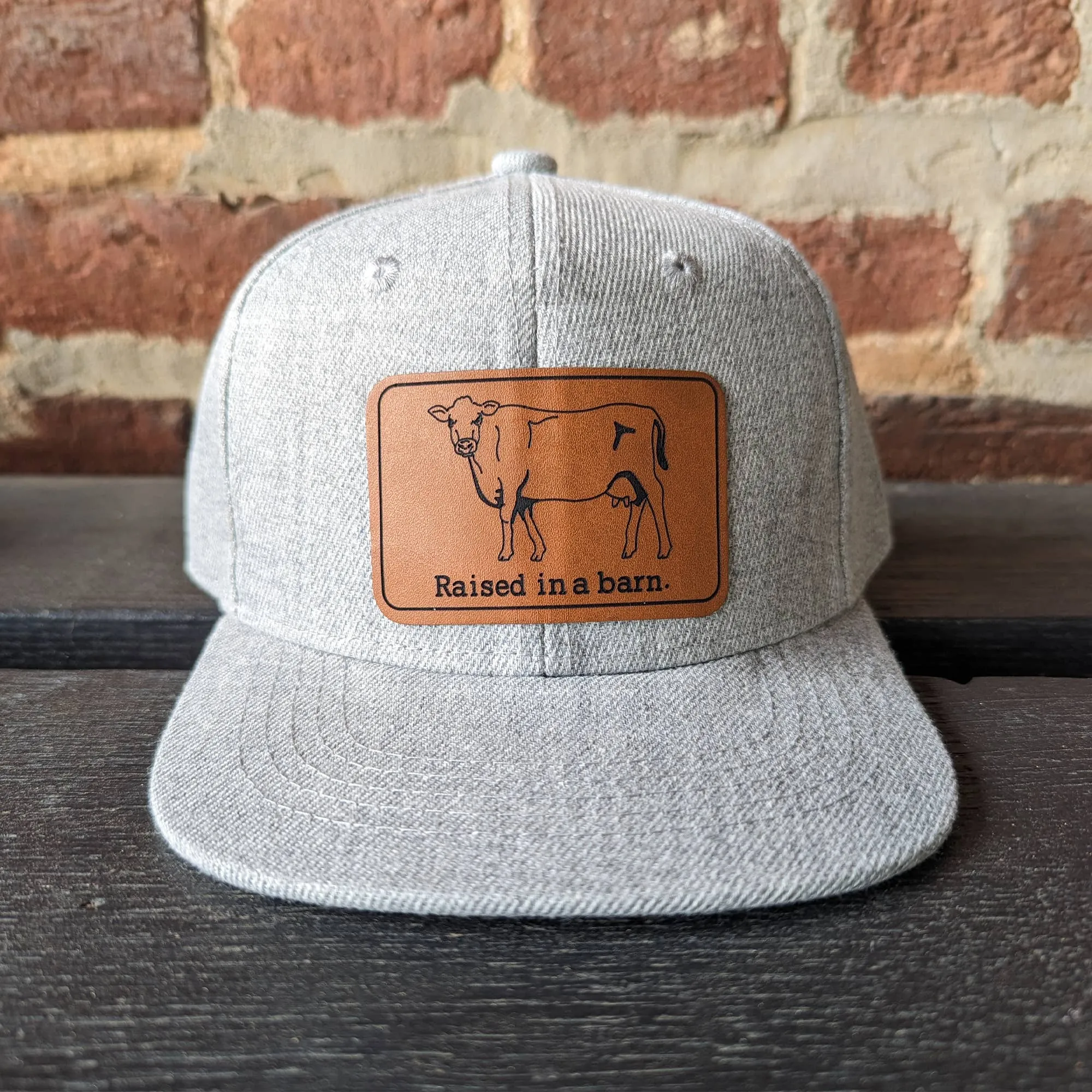 Raised in a Barn Trucker Hat
