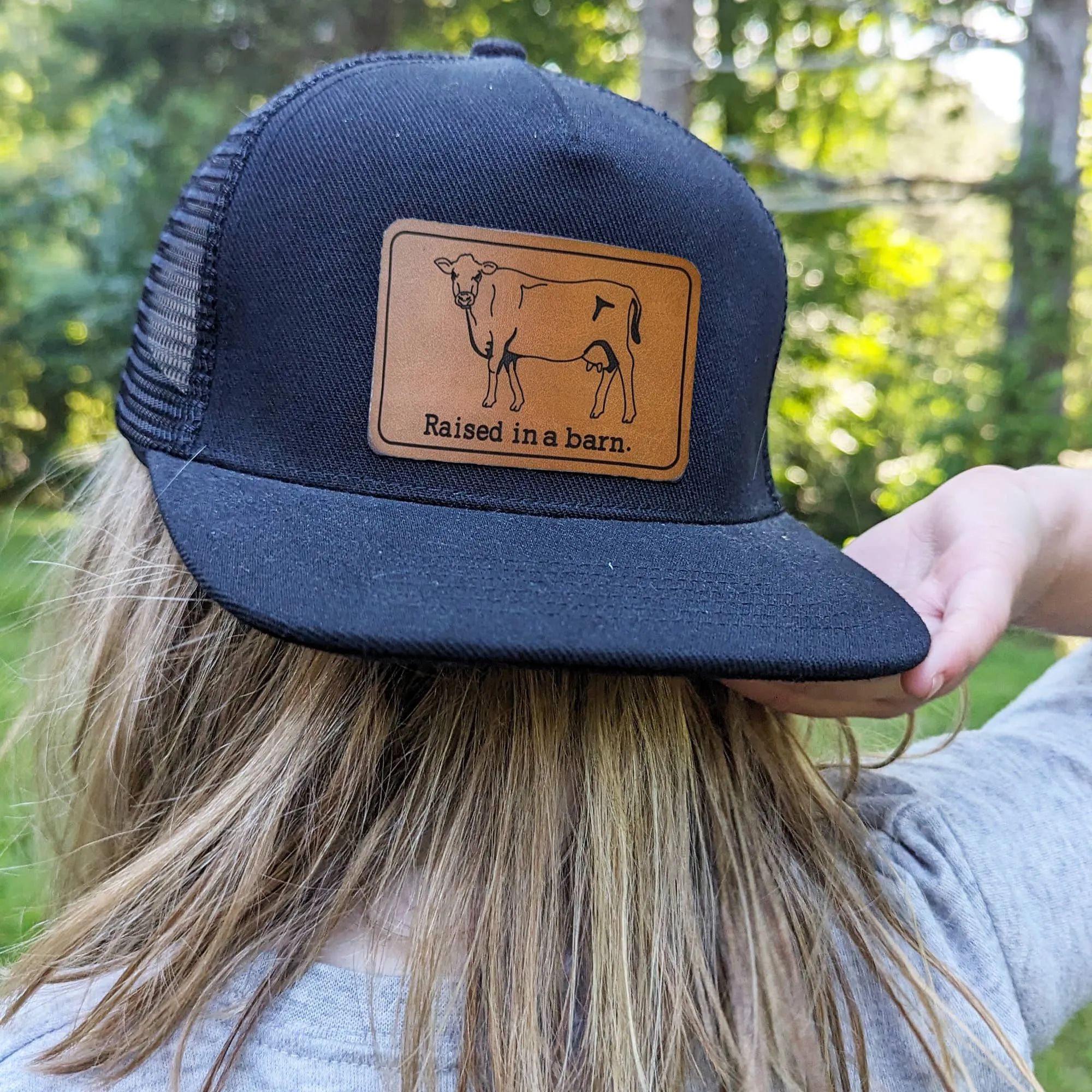 Raised in a Barn Trucker Hat