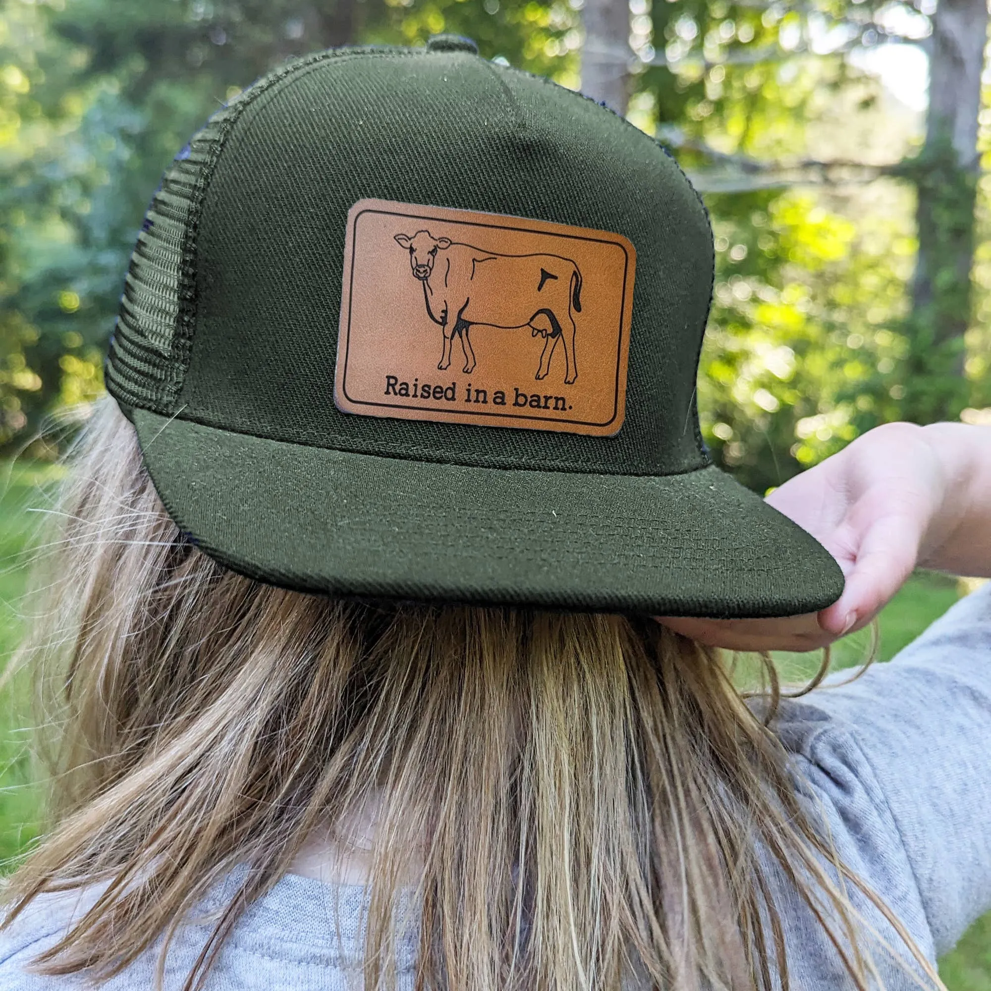 Raised in a Barn Trucker Hat